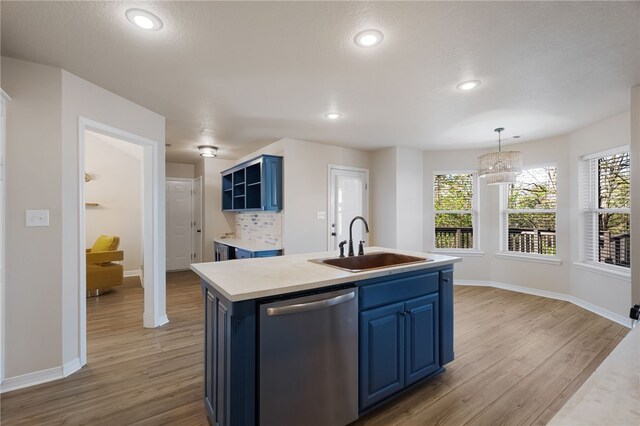 6431 Summer Shade, Van Buren, AR 72956 - kitchen with a sink, blue cabinetry, wood finished floors, and dishwasher