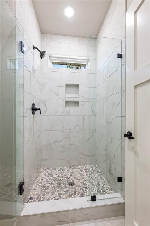 full bathroom with a stall shower