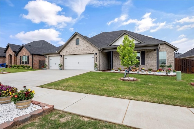 2109 Abbott Ln, Pea Ridge, AR 72751 - view of front facade with an attached garage, brick siding, and driveway
