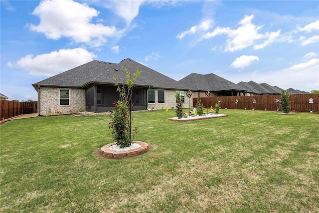 2109 Abbott Ln, Pea Ridge, AR 72751 - rear view of property featuring a sunroom, brick siding, and roof with shingles
