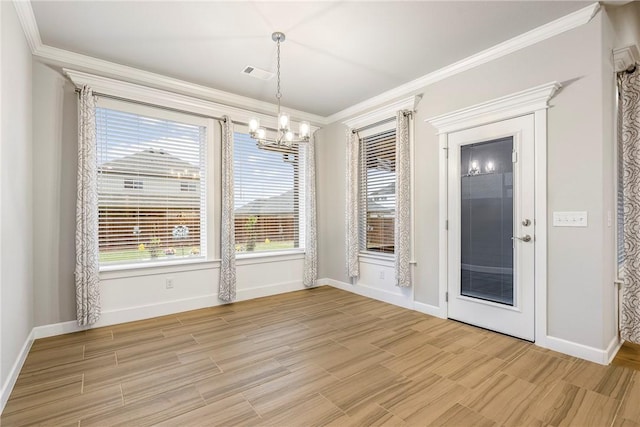 2109 Abbott Ln, Pea Ridge, AR 72751 - unfurnished dining area with a chandelier, ornamental molding, baseboards, and light wood-style floors