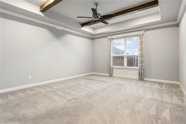 2109 Abbott Ln, Pea Ridge, AR 72751 - unfurnished room with a tray ceiling, carpet, baseboards, ceiling fan, and beamed ceiling