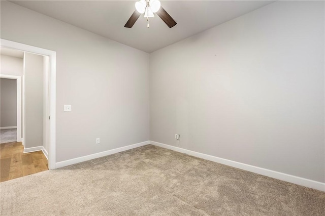 2109 Abbott Ln, Pea Ridge, AR 72751 - empty room featuring light colored carpet, a ceiling fan, baseboards, and lofted ceiling