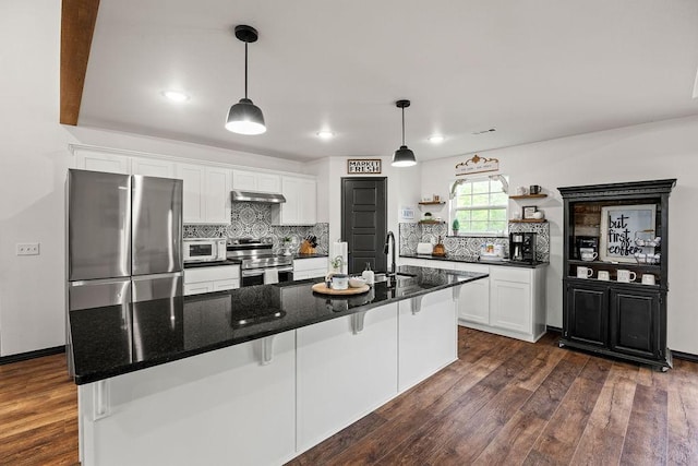 kitchen featuring open shelves, decorative backsplash, appliances with stainless steel finishes, and white cabinets