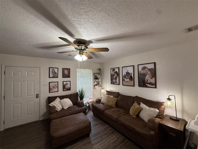 809 Walnut, Dardanelle, AR 72834 - living area featuring visible vents, a textured ceiling, ceiling fan, and wood finished floors