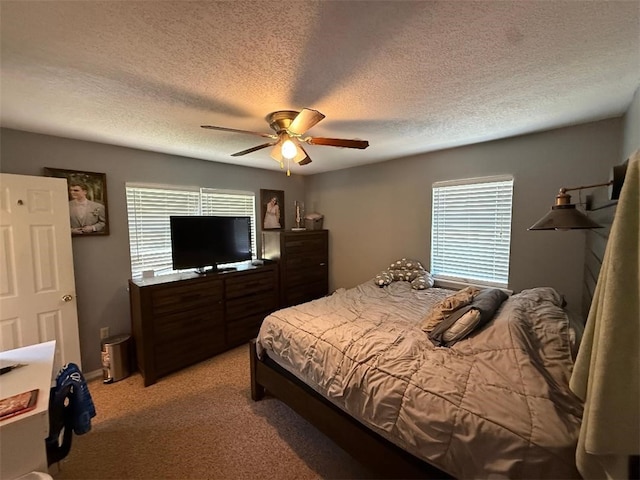 809 Walnut, Dardanelle, AR 72834 - bedroom featuring light colored carpet, a ceiling fan, and a textured ceiling