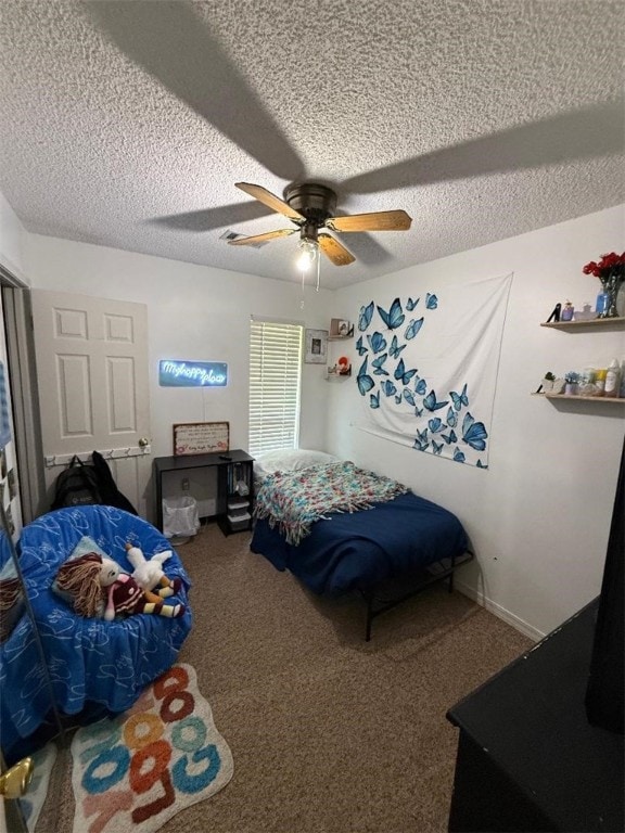 809 Walnut, Dardanelle, AR 72834 - carpeted bedroom featuring baseboards, a ceiling fan, and a textured ceiling