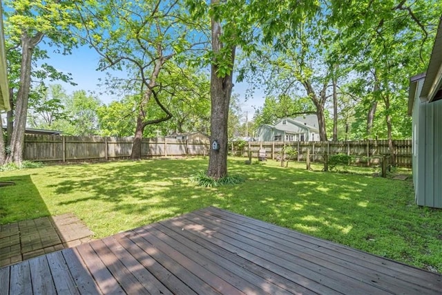 605 N Wright St, Siloam Springs, AR 72761 - wooden deck with a lawn and a fenced backyard