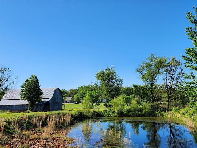 view of water feature featuring a barn