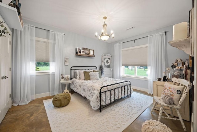 bedroom with baseboards, concrete flooring, a chandelier, and multiple windows