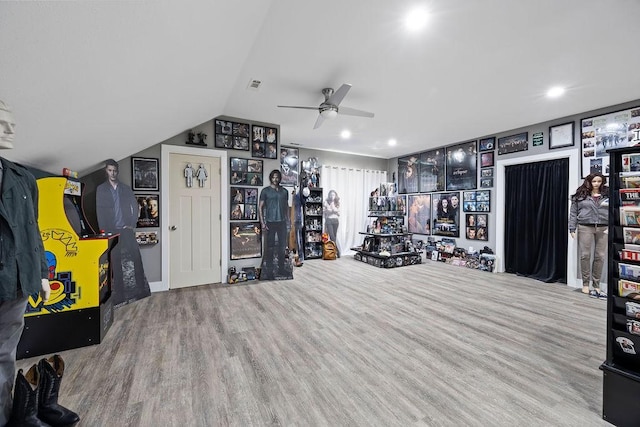 playroom featuring ceiling fan, vaulted ceiling, recessed lighting, and wood finished floors