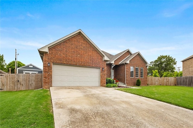 view of front facade featuring brick siding, driveway, and a garage
