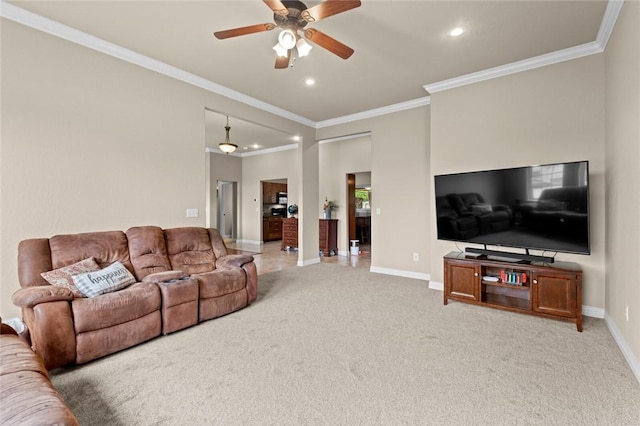 living room featuring a ceiling fan, baseboards, light colored carpet, recessed lighting, and crown molding