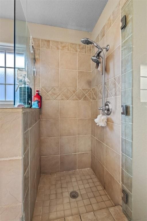 full bath featuring a shower stall