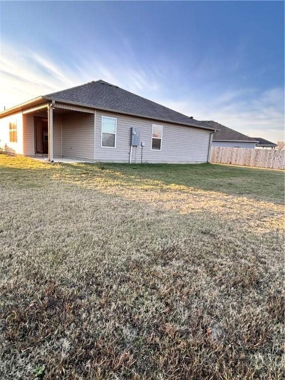 2007 Fennec St, Siloam Springs, AR 72761 - back of property featuring a yard and fence