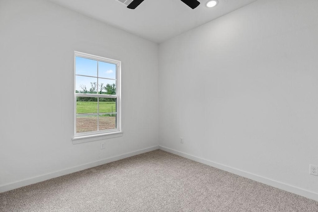spare room with recessed lighting, baseboards, a ceiling fan, and carpet floors