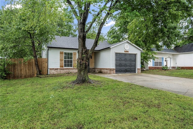 single story home with fence, an attached garage, brick siding, and concrete driveway