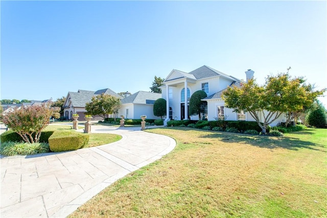 1800 Wheaton Trce, Fort Smith, AR 72908 - view of front facade with a front lawn and stucco siding