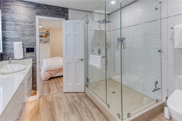 1800 Wheaton Trce, Fort Smith, AR 72908 - full bathroom with ensuite bath, vanity, wood finished floors, and a shower stall