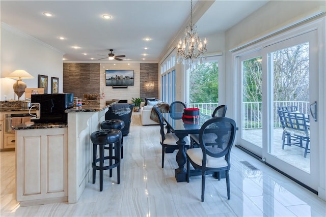 1800 Wheaton Trce, Fort Smith, AR 72908 - dining space with visible vents, ceiling fan with notable chandelier, ornamental molding, and recessed lighting