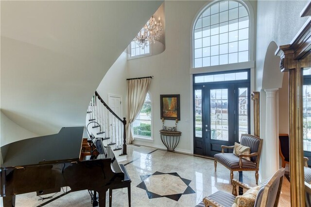 1800 Wheaton Trce, Fort Smith, AR 72908 - entryway featuring stairway, baseboards, decorative columns, and a high ceiling