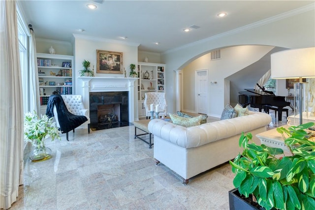 1800 Wheaton Trce, Fort Smith, AR 72908 - living room featuring recessed lighting, built in features, a fireplace with flush hearth, crown molding, and arched walkways