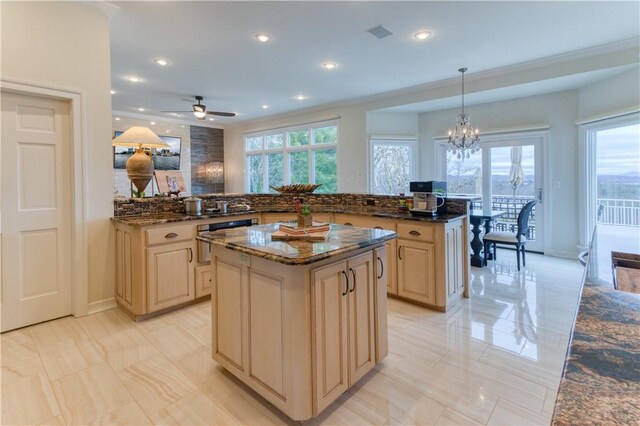 1800 Wheaton Trce, Fort Smith, AR 72908 - kitchen with dark stone counters, a center island, ceiling fan with notable chandelier, and recessed lighting