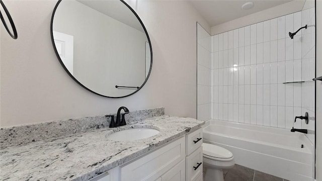 full bath with toilet, shower / tub combination, vanity, and tile patterned floors