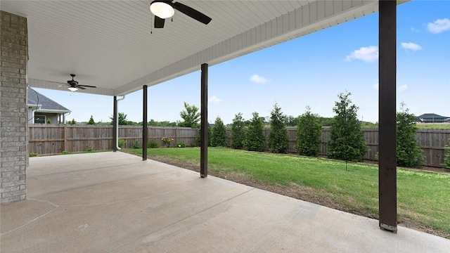 view of patio featuring ceiling fan