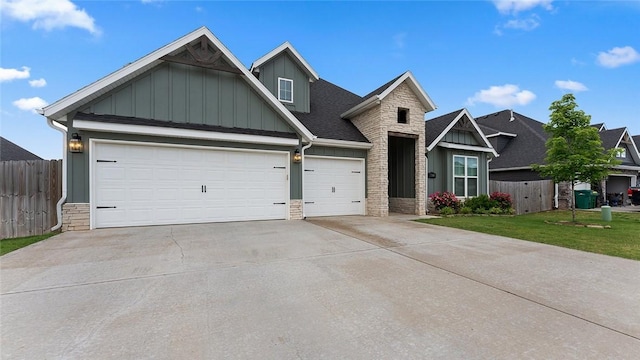 1160 Silver Maple St, Centerton, AR 72719 - craftsman inspired home featuring board and batten siding, stone siding, concrete driveway, an attached garage, and a shingled roof