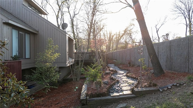 5008 Cliff Dr, Fort Smith, AR 72903 - fenced backyard with a wooden deck