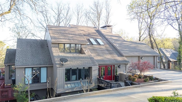 5008 Cliff Dr, Fort Smith, AR 72903 - view of front of house with concrete driveway, a shingled roof, a chimney, french doors, and an attached garage