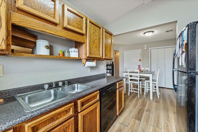 1165 Massey St, Decatur, AR 72722 - kitchen featuring a sink, a textured ceiling, open shelves, and black appliances
