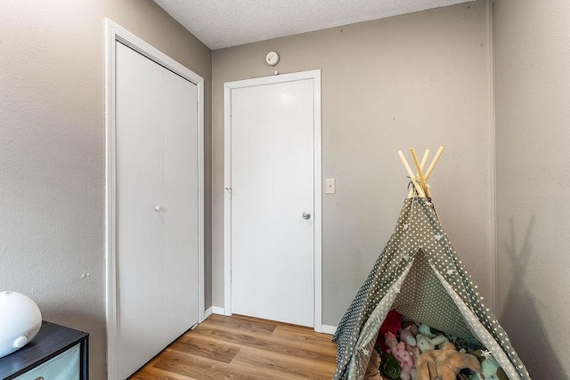 1165 Massey St, Decatur, AR 72722 - corridor with light wood finished floors