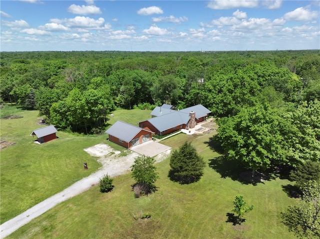 bird's eye view with a view of trees