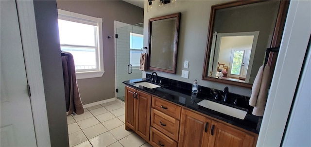 full bathroom with a sink, a wealth of natural light, and a stall shower