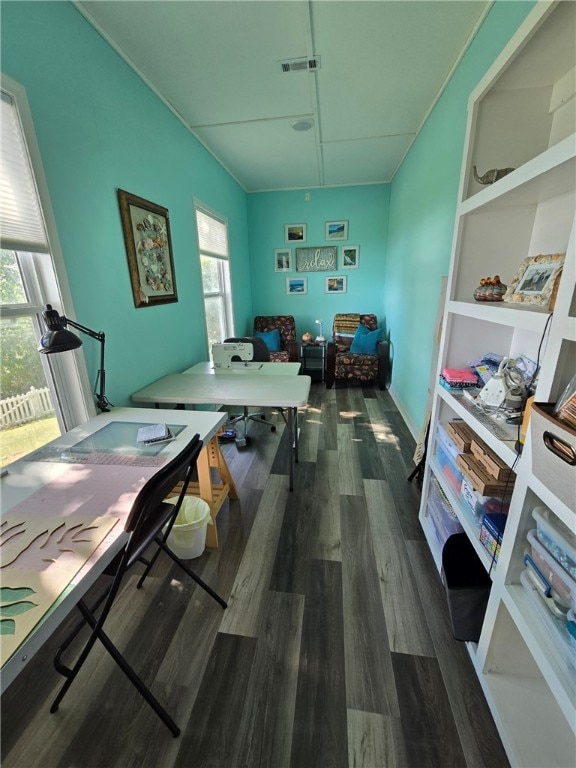 office featuring visible vents and wood finished floors