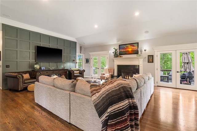 7 Croft Ledge Dr, Bentonville, AR 72712 - living area featuring french doors, plenty of natural light, and wood finished floors