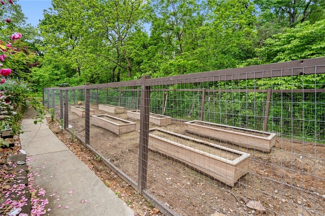 7 Croft Ledge Dr, Bentonville, AR 72712 - view of home's community featuring a vegetable garden and fence