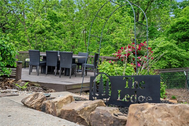 7 Croft Ledge Dr, Bentonville, AR 72712 - wooden deck featuring outdoor dining area