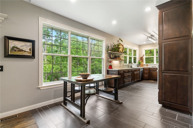 7 Croft Ledge Dr, Bentonville, AR 72712 - dining room with baseboards, recessed lighting, and dark wood-style flooring
