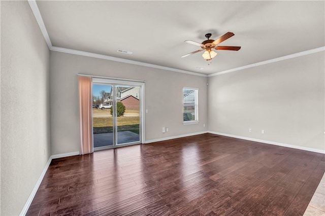 unfurnished room featuring crown molding, visible vents, ceiling fan, and wood finished floors