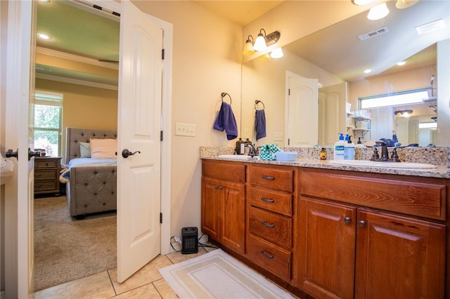 3113 Raven Ln, Fayetteville, AR 72704 - bathroom featuring a sink, double vanity, visible vents, and tile patterned floors
