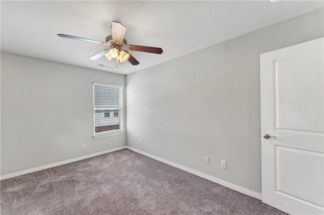 2769 W Kilimanjaro Way, Rogers, AR 72758 - carpeted spare room featuring visible vents, baseboards, and a ceiling fan
