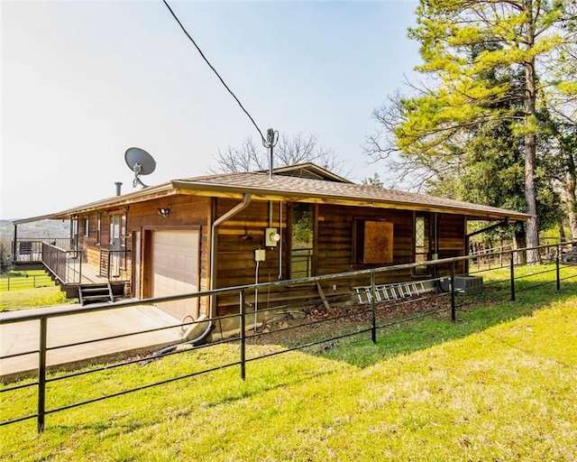 315 N Letitia Ave, Fayetteville, AR 72701 - view of front of home featuring a garage, concrete driveway, and an exterior structure