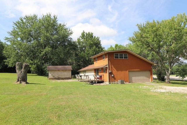 602 Centennial Ave, West Fork, AR 72774 - exterior space with a storage shed, a wooden deck, central air condition unit, a yard, and driveway