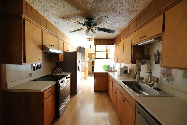 602 Centennial Ave, West Fork, AR 72774 - kitchen featuring a ceiling fan, under cabinet range hood, a sink, electric stove, and light countertops