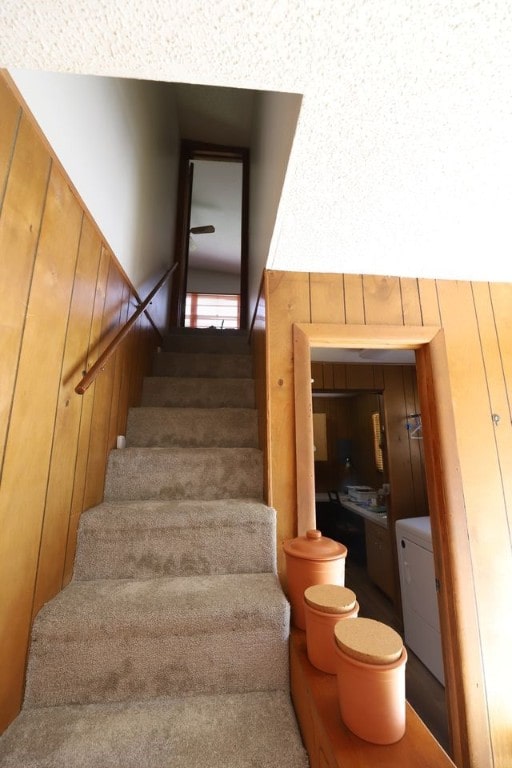 602 Centennial Ave, West Fork, AR 72774 - staircase with washer / clothes dryer, wainscoting, and wood walls