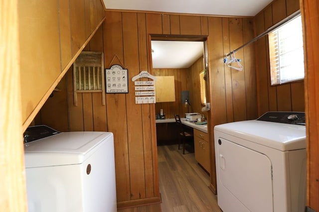 602 Centennial Ave, West Fork, AR 72774 - laundry room featuring washer and clothes dryer, wood walls, and wood finished floors