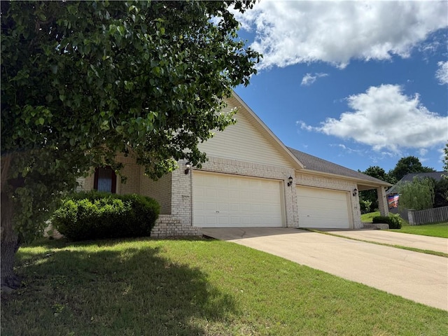 6297/6299 W Milliken Bnd, Fayetteville, AR 72704 - obstructed view of property with concrete driveway, brick siding, a front lawn, and an attached garage